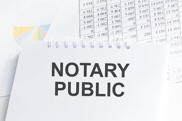 NOTARY PUBLIC is written in a white notepad. Business concept