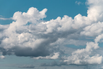 Bright beautiful white clouds against the blue sky.