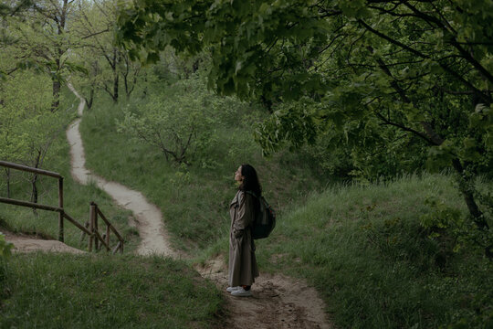 girl on the path in the forest