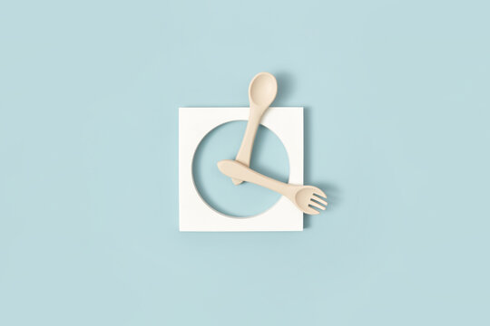 Clock made of silicone kids spoon and fork.