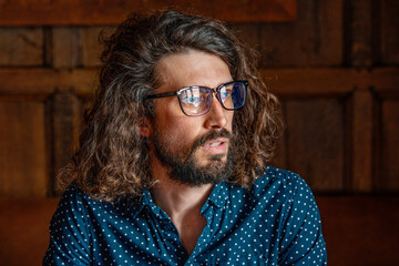 Young professional man at work wearing glasses