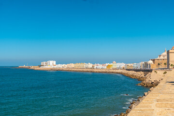 Fototapeta na wymiar Beautiful coast of the tourist city of Cadiz in Andalusia, tourism in summer
