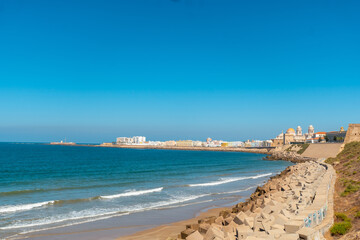 Beautiful coast of the tourist city of Cadiz in Andalusia, tourism in summer