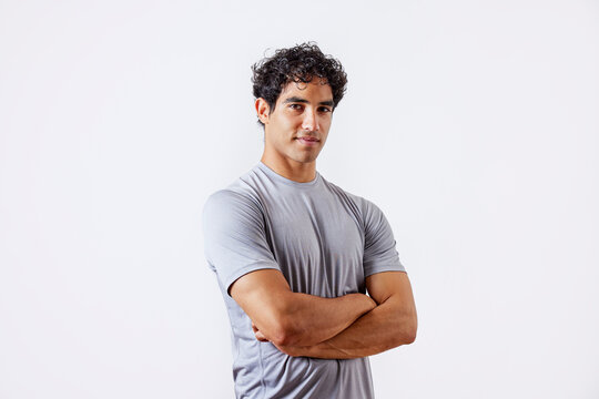Confident Hispanic Sportsman In Gray T Shirt