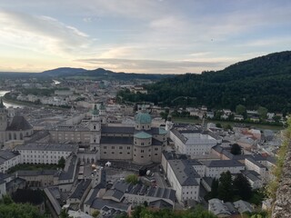 Fototapeta na wymiar Beautiful of Aerial panoramic view on a historic city of Salzburg with st. Peters Abbey, Franciscan Church and Salzburg Cathedral, Austria 