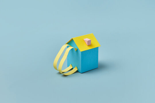 Blue and yellow paper craft backpack.