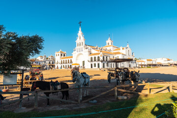 Obraz premium Horses prepared to ride in the Rocio sanctuary at the Rocio festival, Huelva. Andalusia