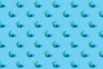 Horizontal backdrop with repeated baby pacifiers.