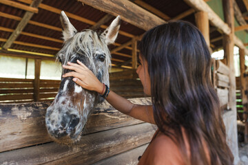 woman with her horse
