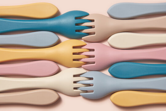 Composition of silicone kids forks in pastel colors