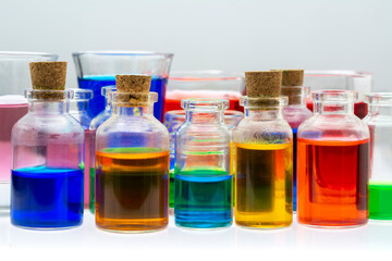 Colored water in small glass bottles