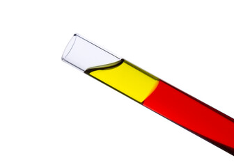 Sesame oil on colored water in test tube