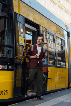 Man Getting Off the Bus