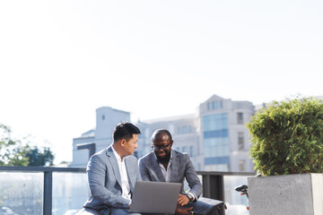 Entrepreneurs working on task in team 