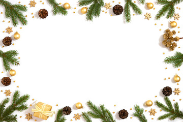 Christmas frame of spruce branches, golden balls and snowflakes. Christmas background on the white....