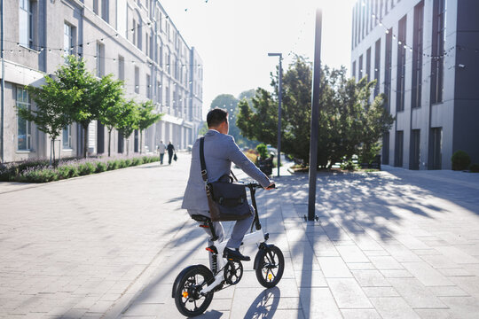 Employee driving bicycle 