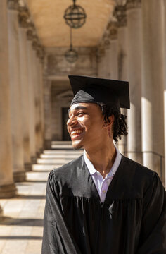 Portrait of Young happy African American college graduate 