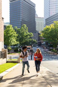 Two cute Friends University Students strut on New England campus 