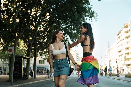 Lesbian couple walking to pride march