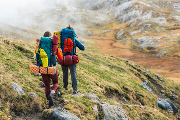Friends hiking on mountain trail