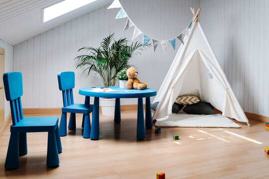 children's playroom with teepee tent