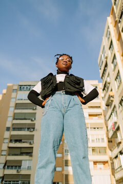 Impressive Woman Standing On A Bench