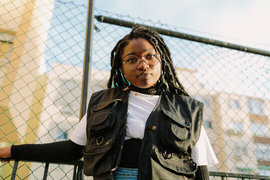 Portrait of a young woman with dreadlocks