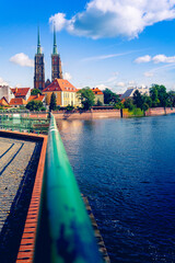 View of Ostrów Tumski in Wrocław with the Cathedral of St. John the Baptist in the background and...