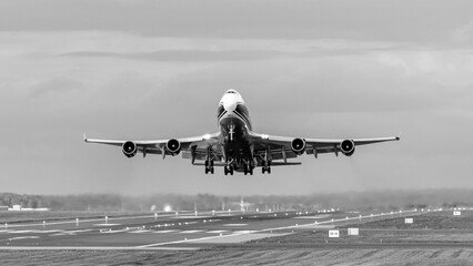 Black and white photo of a 747-400ERF at V2 departing EMA - stock photo