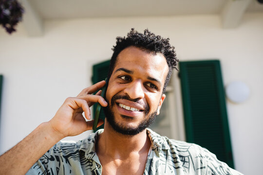 Smiling Man On Cell Phone