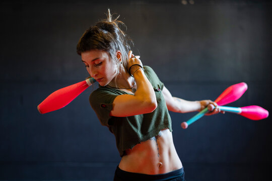 Portrait of a powerful female juggler