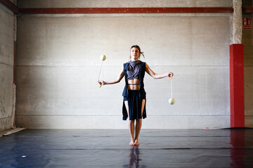 Juggler with poi balls