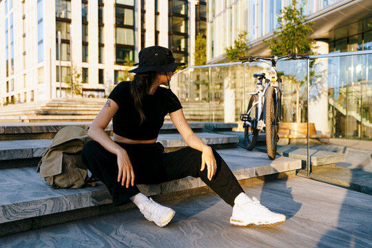 Lifestyle shot of woman sitting on the stairs
