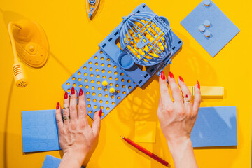 Female hands and lottery game.