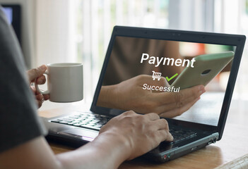 Online shopping and online payment concept. Man hands using laptop computer for online shopping at...