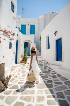 Woman On The Street Of Paros Village, Greece