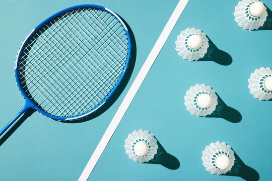 Badminton racket divided from shuttlecocks
