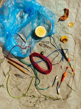 Still life with a bag, fish and floats.