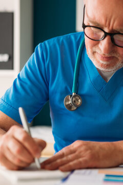 Physician Writing Prescription 