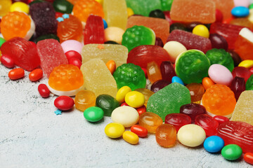 Bright candy lollies on white background	