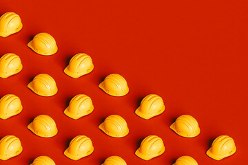 many yellow safety helmets