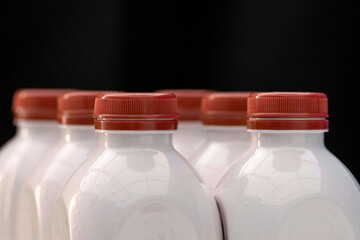 Bottles Of milk With Red caps