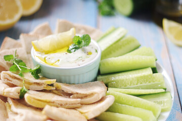 Tzatziki, Greek dip sauce with pita and cucumbers