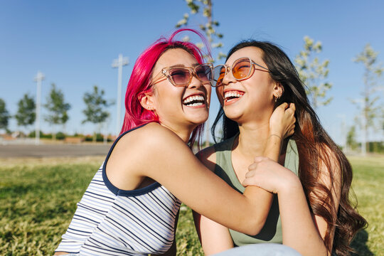 Happy women hugging in park
