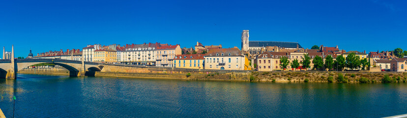 Fototapeta na wymiar Cityscape of Chalon-sur-Saone with view of cathedral. Saone-et-Loire department, France.