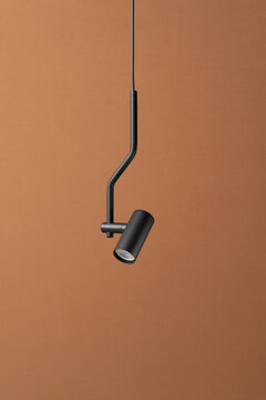 Closeup view at hanging metal bent lamp