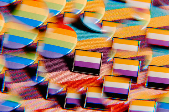kaleidoscopic image of some LGBTIQ pin-back buttons