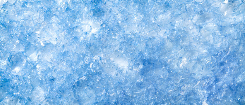 Texture of melting blue frosted ice. Cold or frozen winter background.