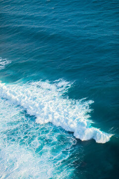 Ocean waves crashing on a sunny day in nature outdoor