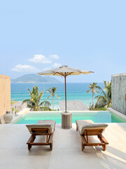 Fototapeta premium Luxury beach resort, water villa bungalow near endless pool over sea.